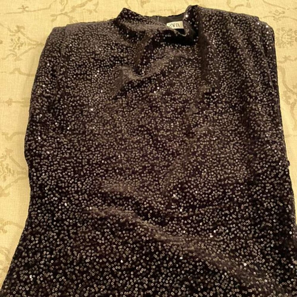 Sleeveless Sequin Blouse with Shoulder Pleats – Glam Statement Top